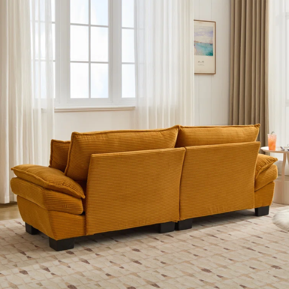 84-inch mustard yellow corduroy loveseat with striped upholstery, pillow-top arms, and two accent pillows—modern, low-profile design ideal for stylish living rooms, apartments, or creative spaces.
