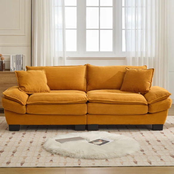84-inch mustard yellow corduroy loveseat with striped upholstery, pillow-top arms, and two accent pillows—modern, low-profile design ideal for stylish living rooms, apartments, or creative spaces.