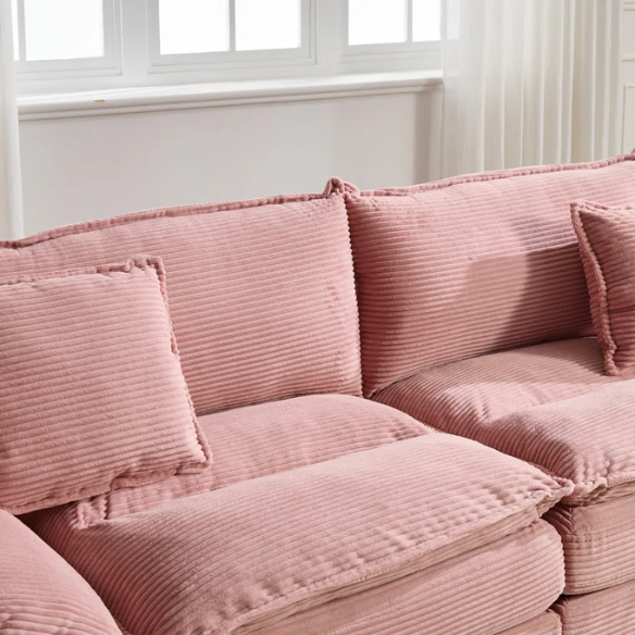 84-inch pink corduroy loveseat with striped upholstery, pillow-top arms, and two accent pillows—modern, playful design ideal for living rooms, apartments, or stylish bedrooms.