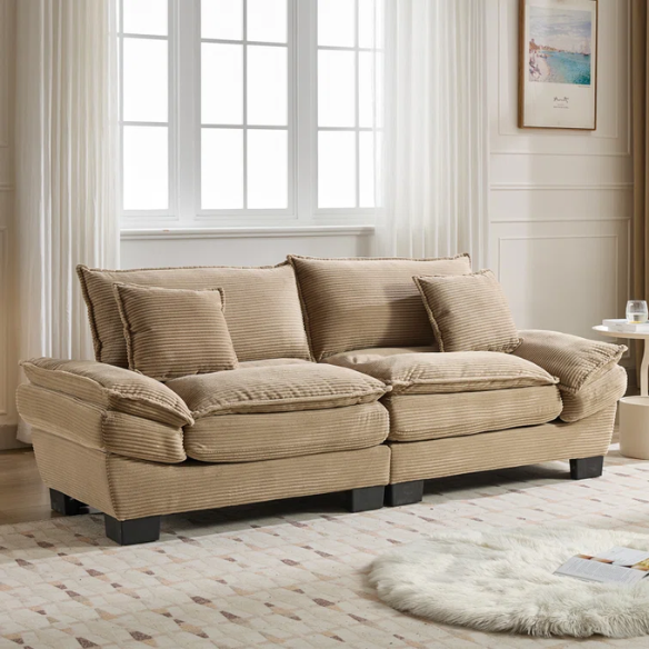 84-inch taupe corduroy loveseat with striped upholstery, pillow-top arms, and two accent pillows—neutral, low-profile design perfect for modern, minimalist, or transitional interiors.