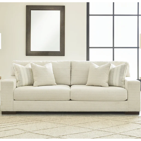 Beige 3-seater sofa with clean-lined silhouette, plush reversible cushions, and neutral polyester upholstery for modern and casual spaces.