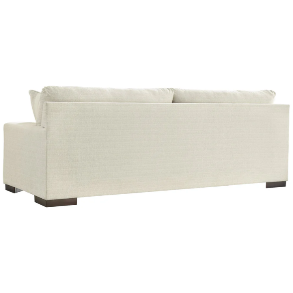 Beige 3-seater sofa with clean-lined silhouette, plush reversible cushions, and neutral polyester upholstery for modern and casual spaces.