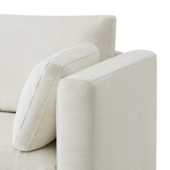 Beige five-piece modular sectional sofa with wide chenille-upholstered seats, two gas-lift storage ottomans, and reversible cushions — a modern and comfortable centerpiece for any living room.