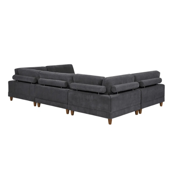 Dark grey modular sectional sofa with soft corduroy upholstery, matching ottoman, and removable cushions — seats six with flexible L- or U-shaped configurations.