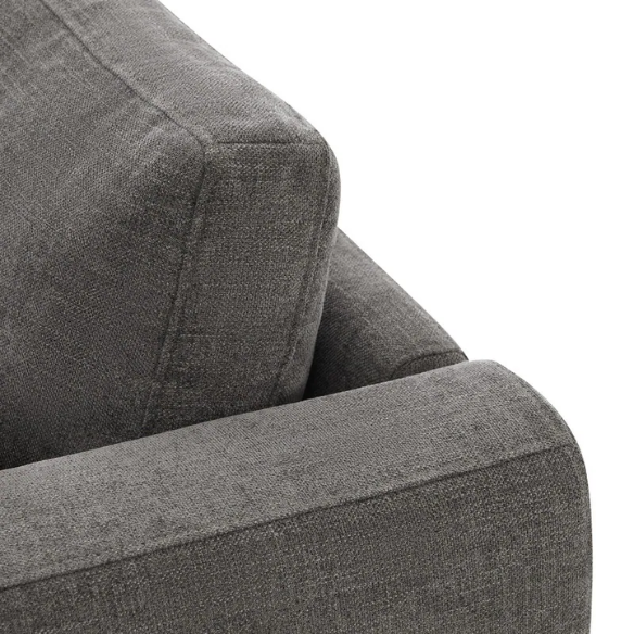 Dark grey five-piece modular sectional sofa with wide chenille-upholstered seats, two gas-lift storage ottomans, and reversible cushions — perfect for flexible and modern living spaces.