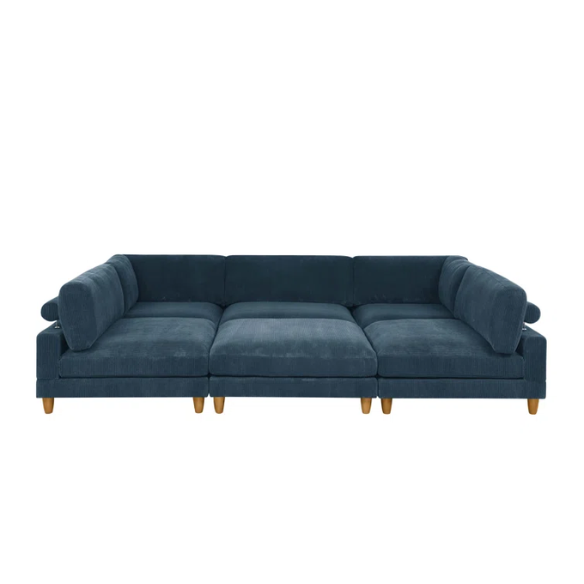 Deep teal modular sectional sofa with plush corduroy fabric, removable cushions, and a matching ottoman — seats six in flexible L- or U-shaped configurations.