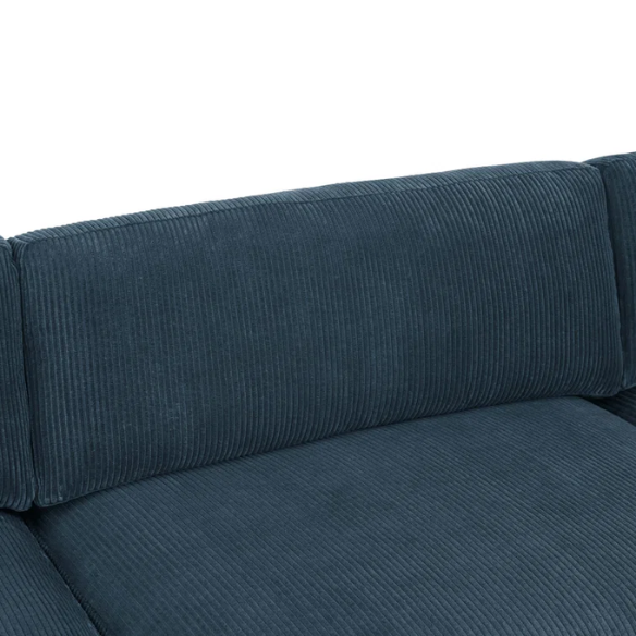 Deep teal modular sectional sofa with plush corduroy fabric, removable cushions, and a matching ottoman — seats six in flexible L- or U-shaped configurations.