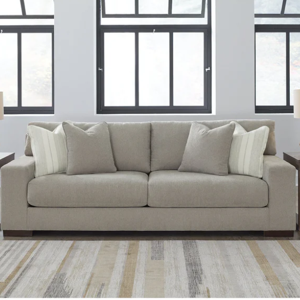 Grey 3-seater sofa with a clean-lined modern silhouette, plush reversible cushions, and durable polyester upholstery—ideal for casual and contemporary living spaces.