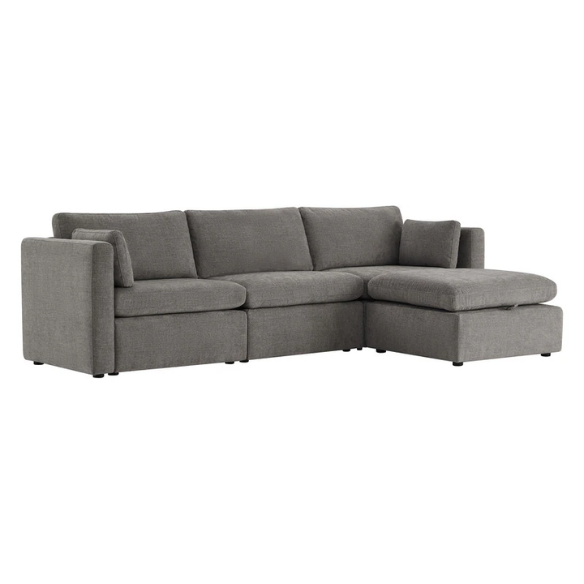 Grey four-piece modular sofa set with wide seats, soft chenille upholstery, removable cushions, and a storage ottoman — ideal for modern, versatile living spaces.