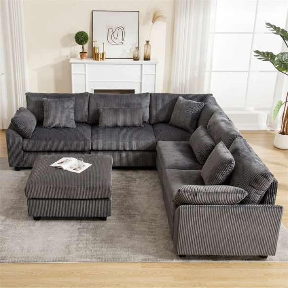Modular grey corduroy sectional sofa with reversible L-shaped configuration, soft removable cushions, and high-density foam seating — perfect for modern living rooms.