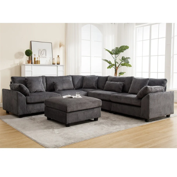 Modular grey corduroy sectional sofa with reversible L-shaped configuration, soft removable cushions, and high-density foam seating — perfect for modern living rooms.
