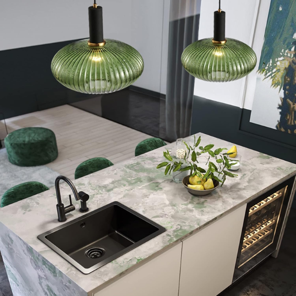 Green glass pendant light with black metal accents and gold finish, modern industrial chandelier for dining room, kitchen, or living room.