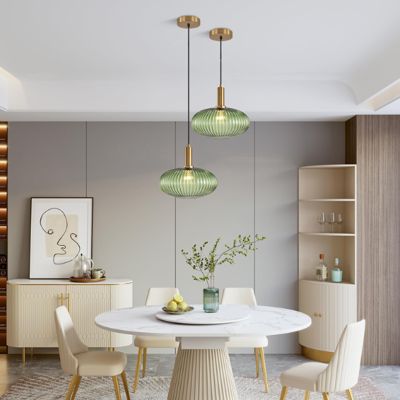 Green glass pendant light with gold accents and matte black metal frame – modern industrial chandelier for dining, living room, or kitchen.