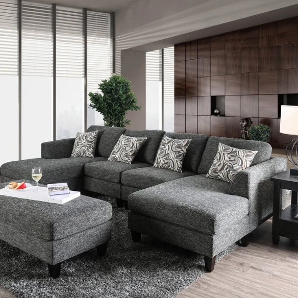 4-piece grey modular sectional sofa with dual chaises, chenille upholstery, flared arms, and accent pillows