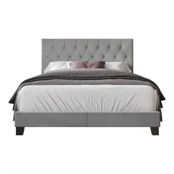 Grey linen full size upholstered bed with button tufted headboard and low-profile legs