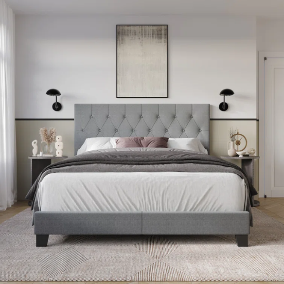 Grey linen full size upholstered bed with button tufted headboard and low-profile legs