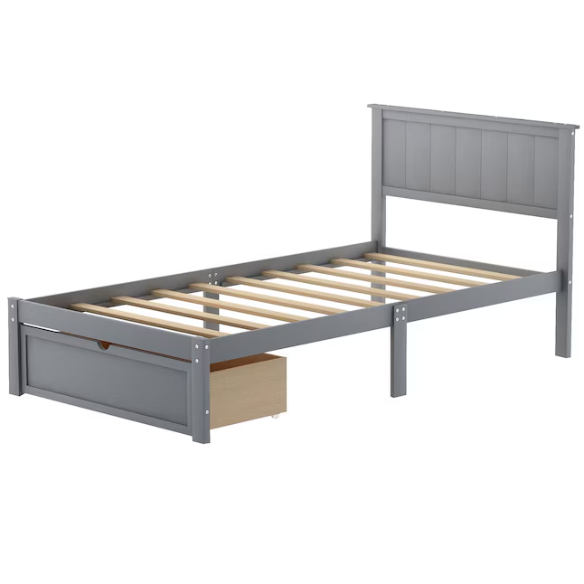 Grey twin platform bed made from solid pine wood with a rectangular headboard and a pull-out underbed storage drawer, featuring sturdy center support legs and a clean modern finish.