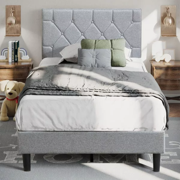 Modern grey upholstered twin bed with button-tufted headboard, steel frame, and slatted base – no box spring required