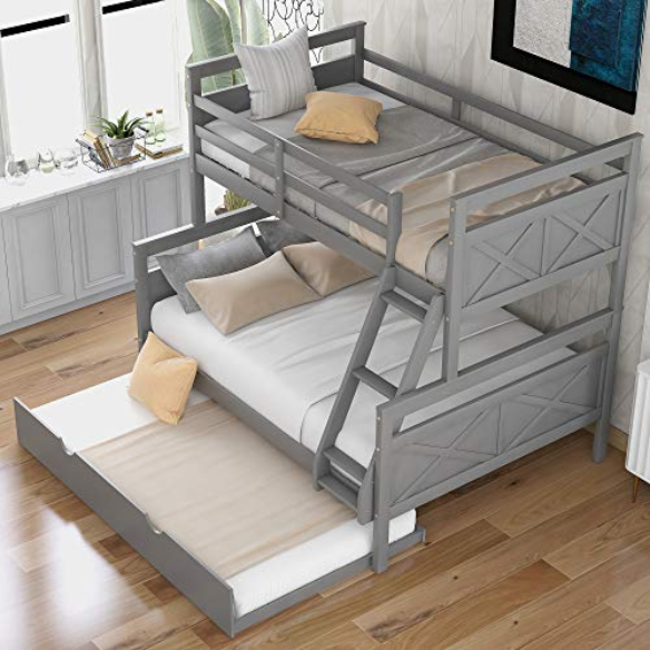 Grey twin over full wood bunk bed with pull-out trundle, safety guardrails, and angled ladder – space-saving design for kids or guest rooms.