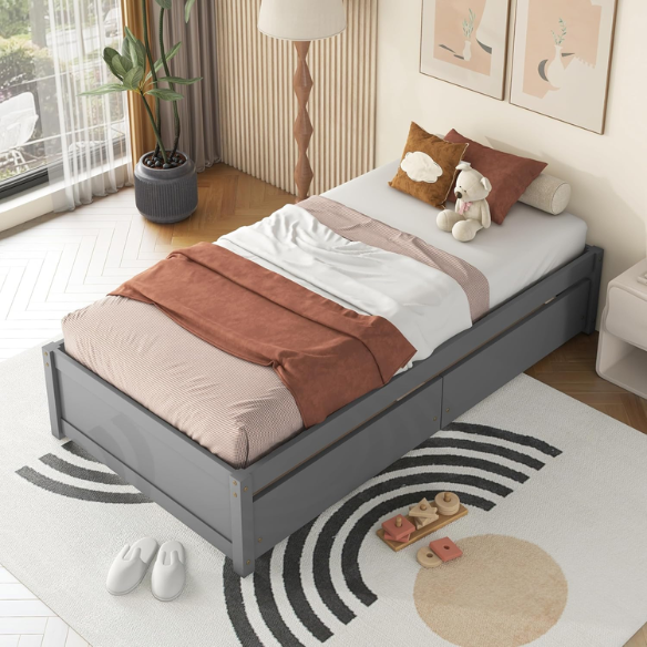 Grey twin platform bed with two underbed storage drawers, made from solid wood with a modern low-profile design—perfect for kids, teens, or guest rooms.