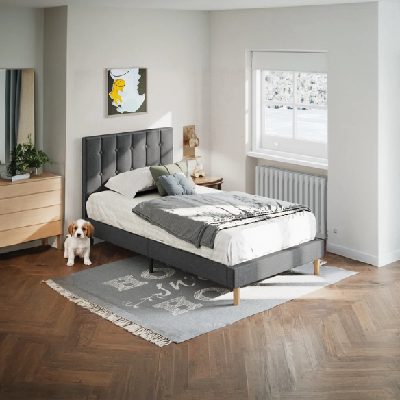 Grey twin bed frame with tufted velvet headboard, sturdy metal and wood construction, and 7.9-inch under-bed storage clearance.