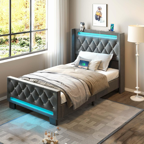 Modern grey twin bed with LED lights, USB charging ports, and upholstered velvet headboard and footboard – no box spring required