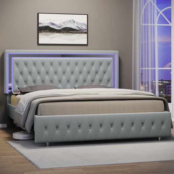 Grey velvet full size platform bed with LED lighted tufted headboard and mirrored accents, featuring modern style and underbed storage clearance.