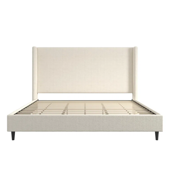 Ivory bouclé upholstered king-size platform bed with tall wingback headboard, wood slats, and no box spring required.
