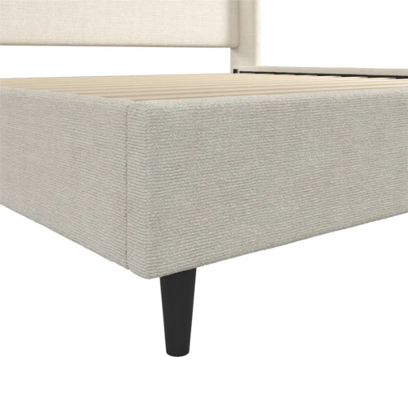 Ivory bouclé upholstered king-size platform bed with tall wingback headboard, wood slats, and no box spring required.