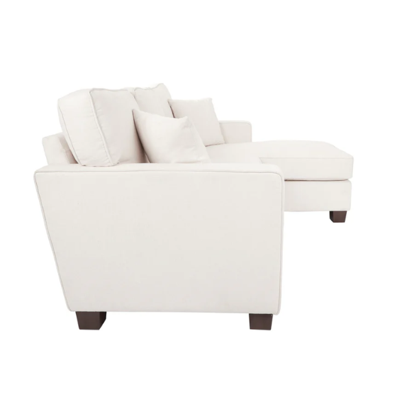 Ivory upholstered sectional sofa with reversible chaise, square arms, cushion back, and coffee-finished wood block legs