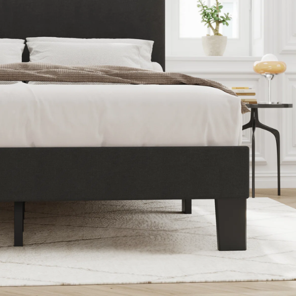 King-size upholstered platform bed with adjustable linen headboard, underbed storage clearance, and soft padded frame in modern design