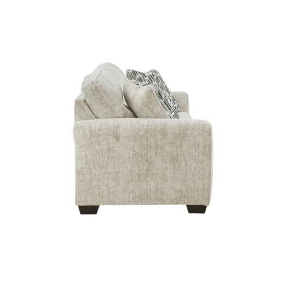 Light beige 3-seater sofa with plush cushions, accent pillows, and dark tri-block legs, ideal for modern living rooms.