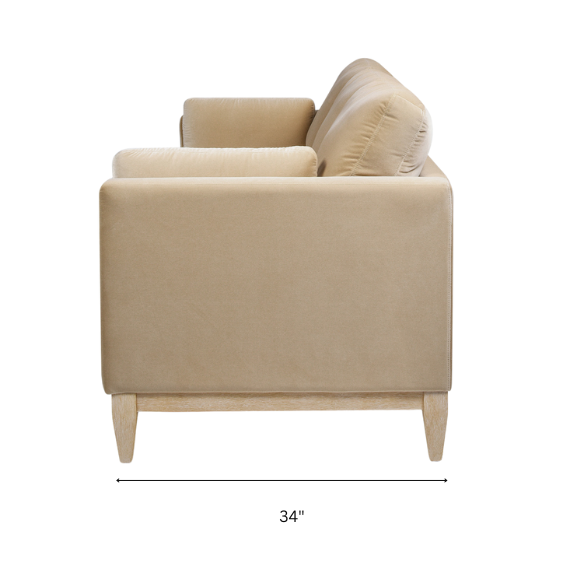 Light camel velvet 3-seater sofa with feather-down cushions, track arms, and solid wood legs, ideal for modern and transitional spaces.