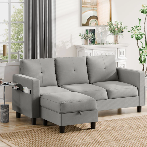 Compact light grey L-shaped sectional sofa with storage ottoman, firm cushions, and stain-resistant fabric, perfect for small spaces.