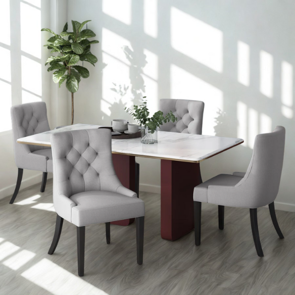 Set of four light grey upholstered dining chairs with diamond tufted backs, armless design, sloped armrests, and espresso brown wood legs.