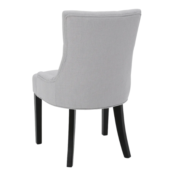 Set of four light grey upholstered dining chairs with diamond tufted backs, armless design, sloped armrests, and espresso brown wood legs.