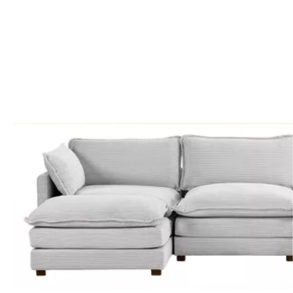 Light grey modular 4-seat sectional sofa with two matching ottomans, upholstered in soft corduroy fabric with high-resilience cushions and a durable wood and metal frame.