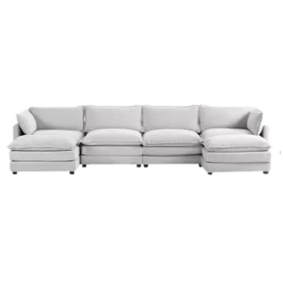 Light grey modular 4-seat sectional sofa with two matching ottomans, upholstered in soft corduroy fabric with high-resilience cushions and a durable wood and metal frame.