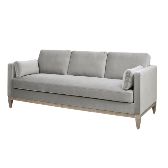 Light grey velvet 3-seater sofa with feather-down cushions, track arms, and natural wood legs, designed for modern and transitional spaces.