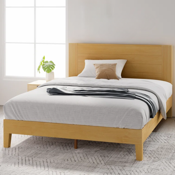 Light natural wood queen platform bed with slatted base and rectangular headboard, made from solid pine with metal center support legs