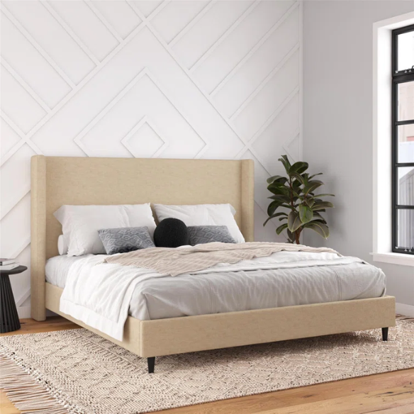 Light tan canvas upholstered king platform bed with tall wingback headboard, no box spring required