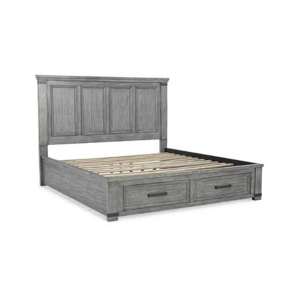 King-size storage bed in light weathered gray finish with tall panel headboard, footboard drawers, and dark bronze hardware accents