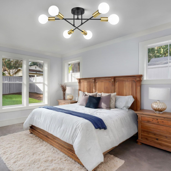 Minimalist black pendant light with gold accents, AC powered, ceiling mount.