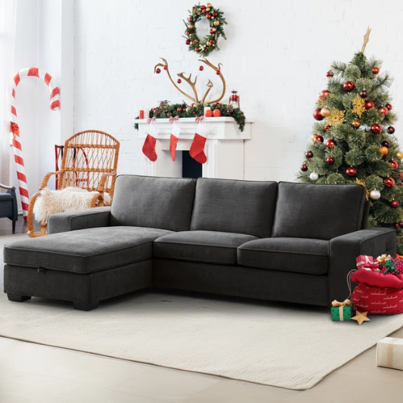 Modern black chenille upholstered sofa with reversible cushions, built-in USB charging port, under-seat storage, and matching ottoman and toss pillows.