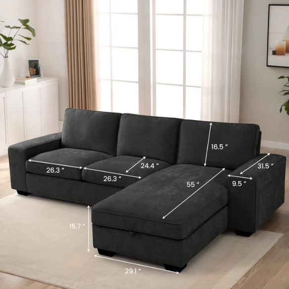 Modern black chenille upholstered sofa with reversible cushions, built-in USB charging port, under-seat storage, and matching ottoman and toss pillows.