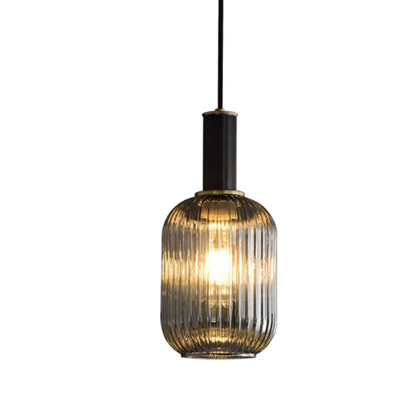 Modern black glass pendant light with frosted smoke gray shade and brass finish for contemporary home decor.