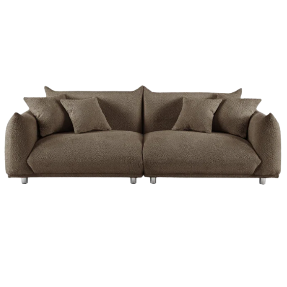 Modern camel upholstered sofa with deep seating and chrome-finished legs, featuring 4 matching accent pillows, ideal for stylish living rooms.