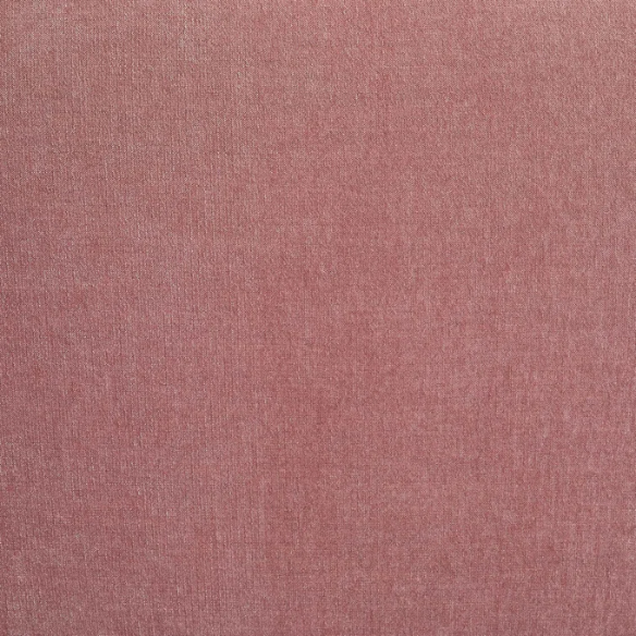 Modern dusty rose upholstered sofa with deep seating and chrome-finished legs, featuring four matching accent pillows—ideal for soft, stylish living spaces.