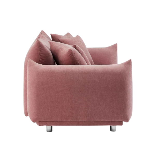 Modern dusty rose upholstered sofa with deep seating and chrome-finished legs, featuring four matching accent pillows—ideal for soft, stylish living spaces.
