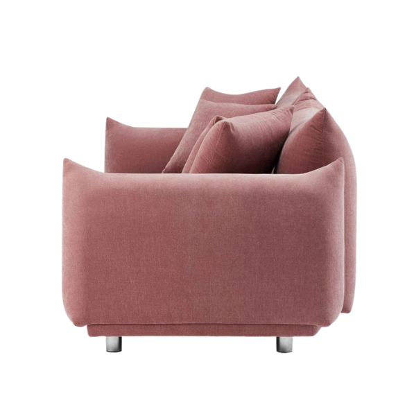 Modern dusty rose upholstered sofa with deep seating and chrome-finished legs, featuring four matching accent pillows—ideal for soft, stylish living spaces.